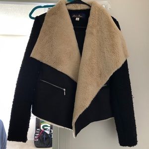 Francesca’s black and tan fur jacket size small